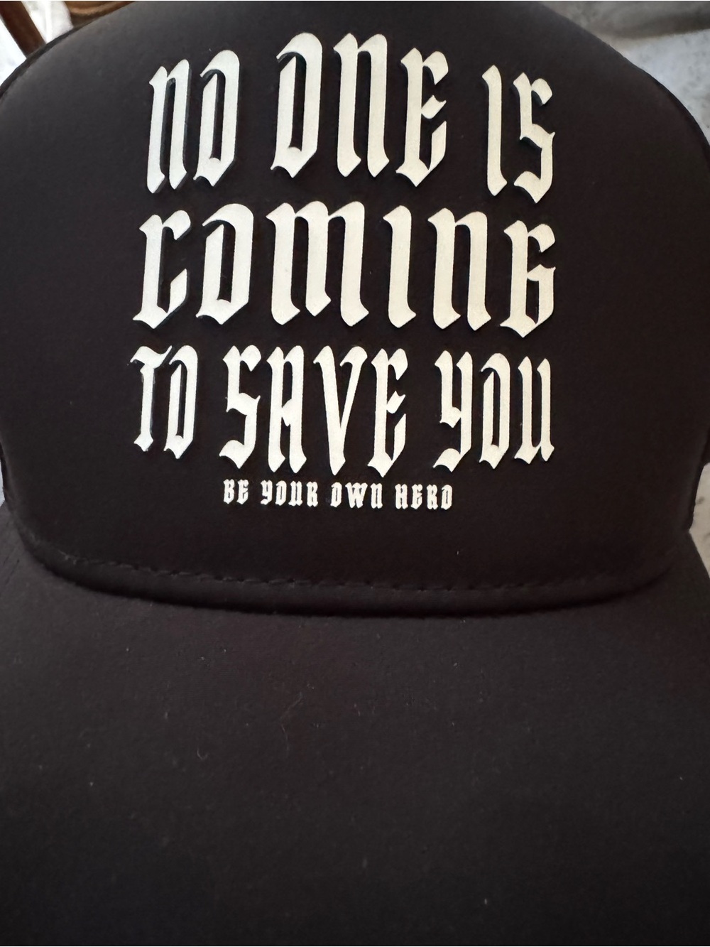 Black Graphic Trucker Hat with White Gothic Text